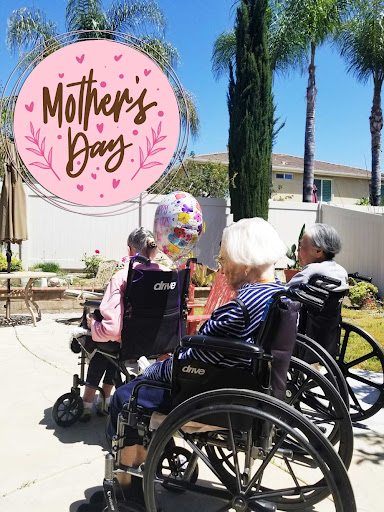 Celebrating Mother's Day with joy and togetherness in the sunshine.