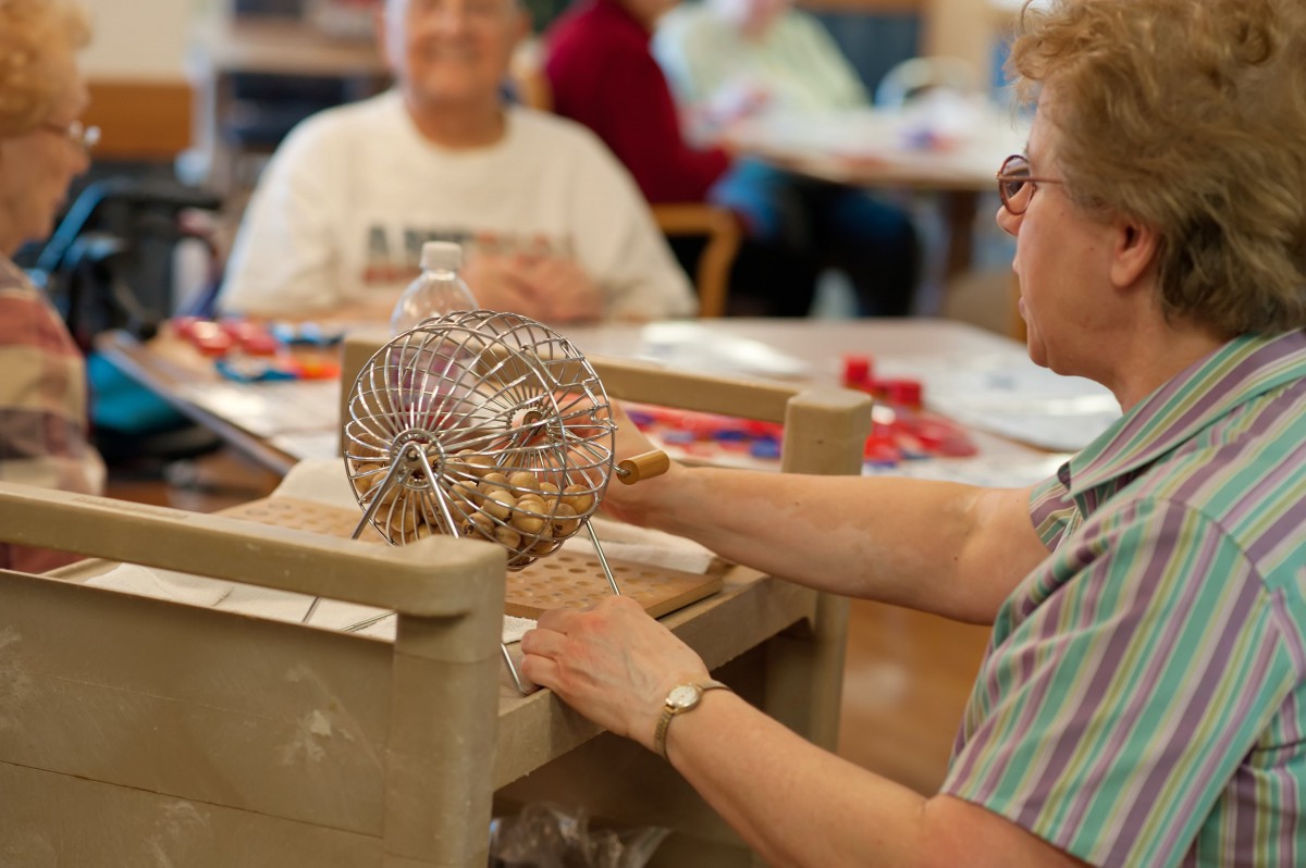 A group of seniors playing bingo at a community center.