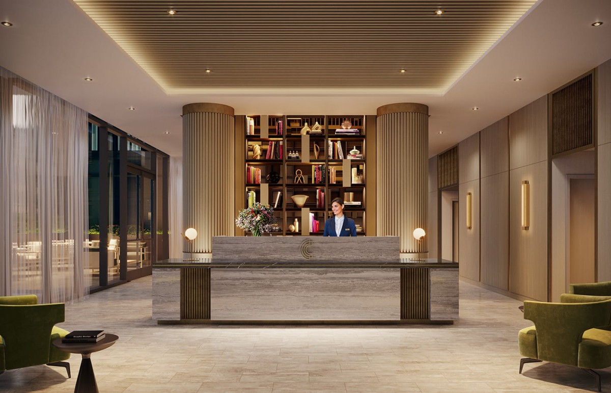A modern hotel lobby with elegant interior design and a reception counter.