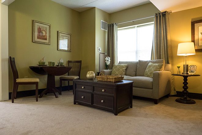 A cozy living room with comfortable furniture and warm decor.