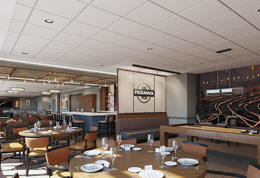 A modern restaurant interior featuring a stylish dining area with wooden accents and a dedicated bar section.