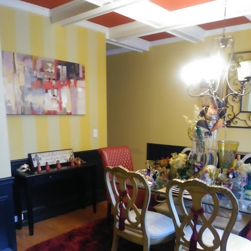 A stylish dining room with decorative elements and elegant furnishings.