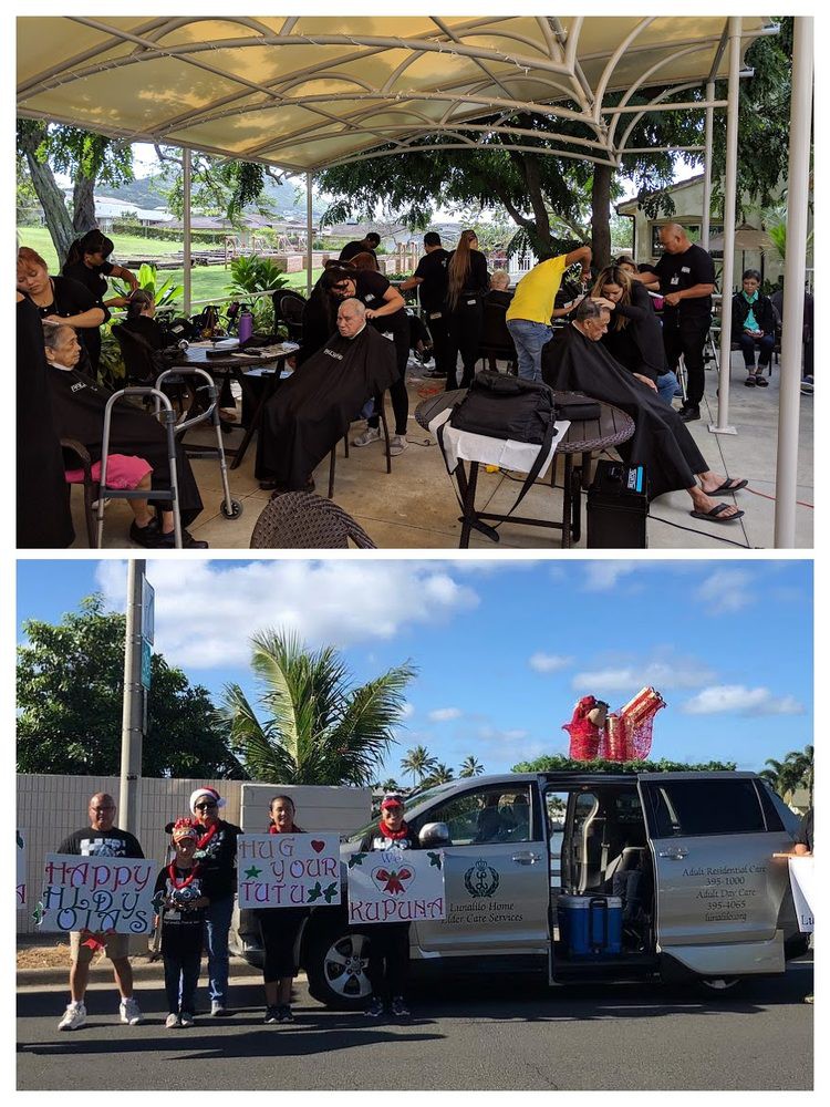A group of people gather in protest, holding signs outdoors.