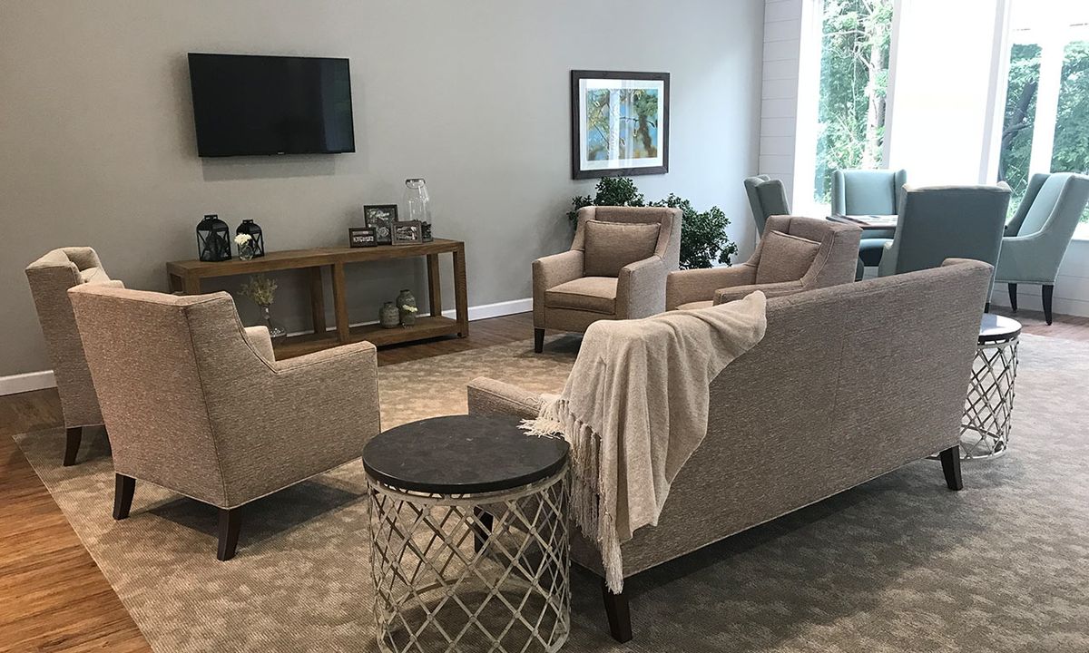 A modern living room with comfortable seating and tasteful decor.
