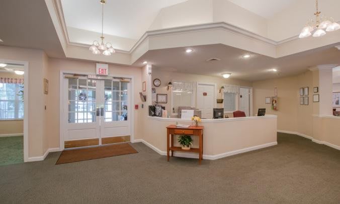 A welcoming reception area with a front desk and waiting space.
