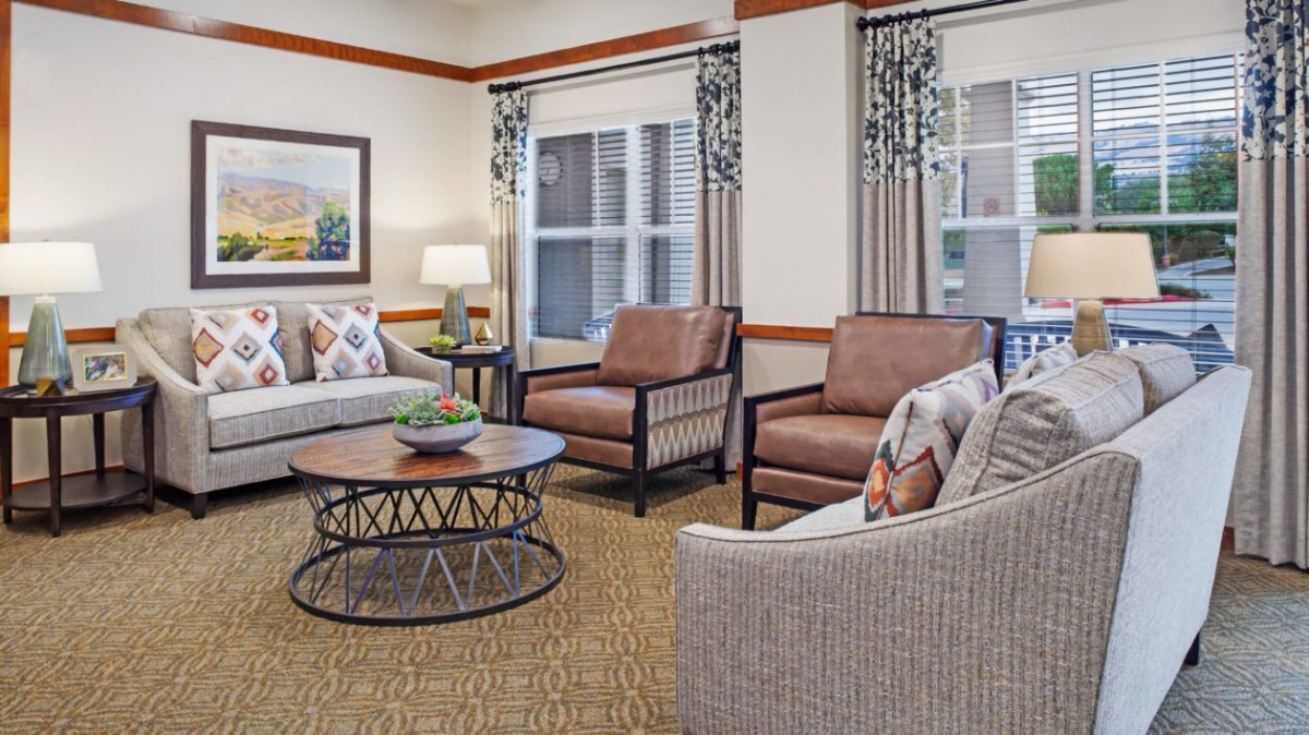 A cozy living room with comfortable seating and tasteful decor.