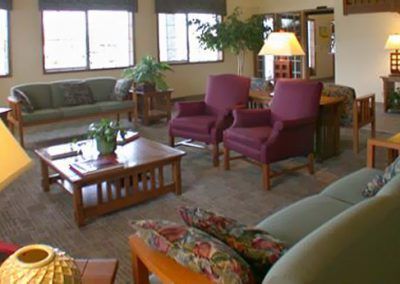 A cozy living room with comfortable seating and natural light.