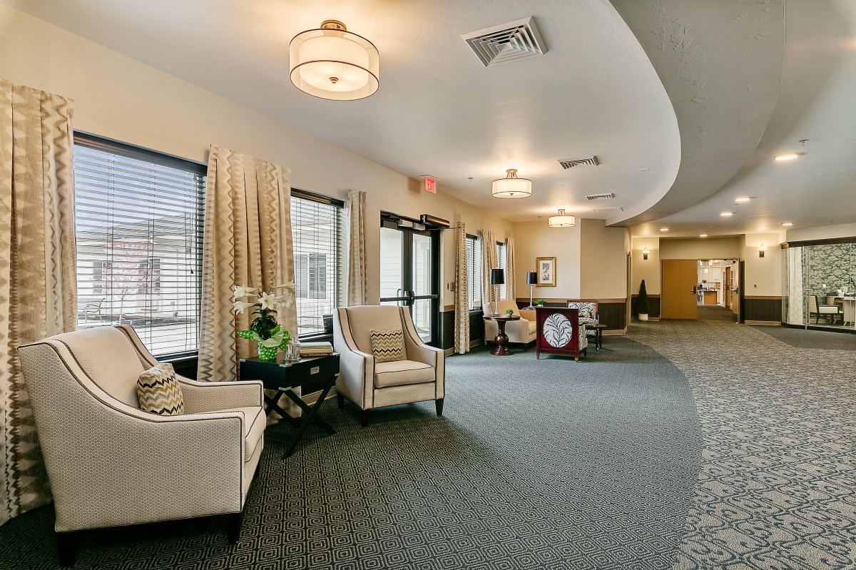 A modern lobby area with comfortable seating and natural lighting.