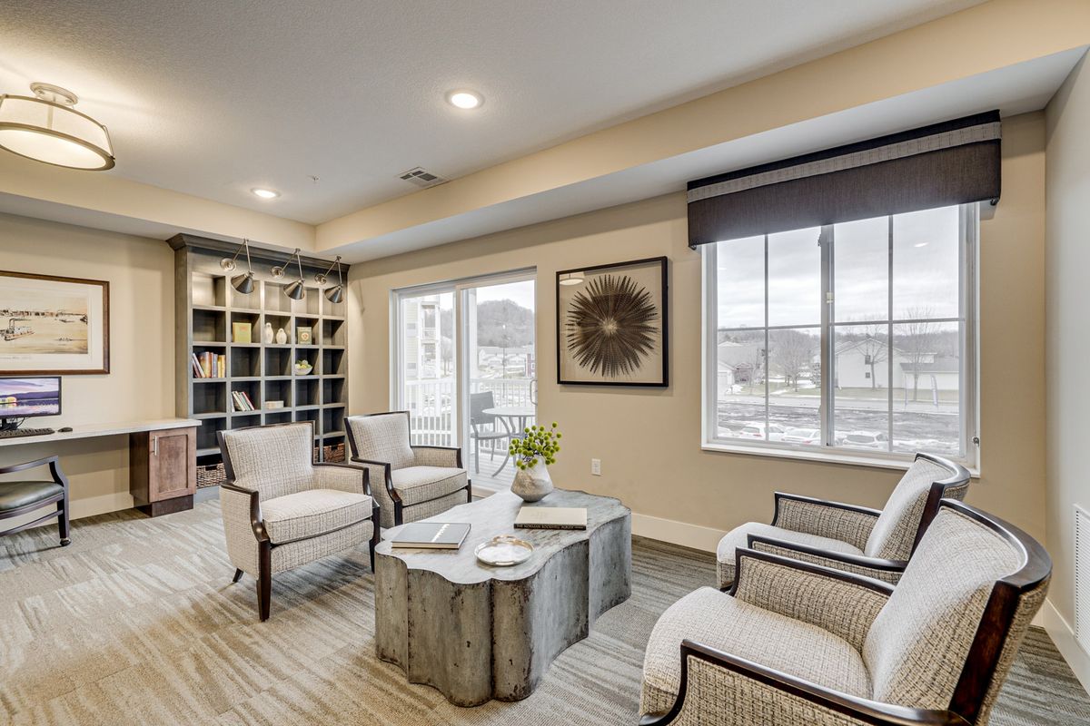 A modern living room with comfortable seating and stylish decor.