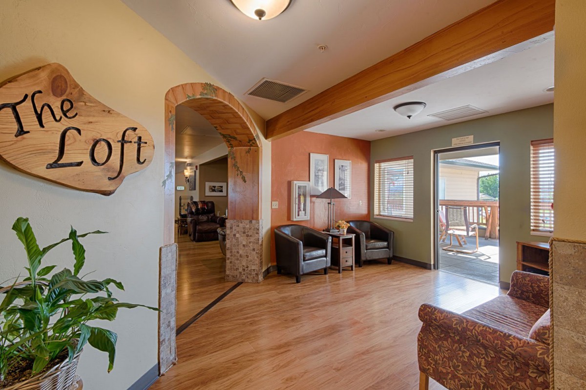 A cozy lobby area with comfortable seating and natural lighting.