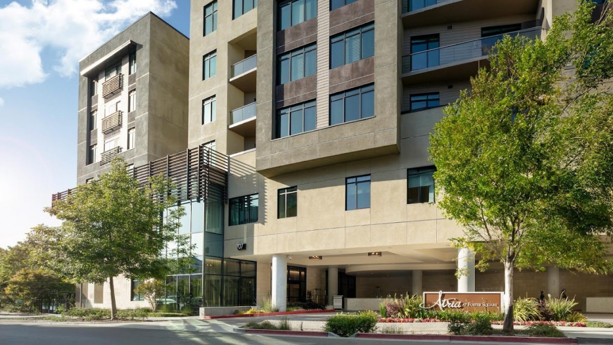 A modern residential apartment building with a welcoming entrance.