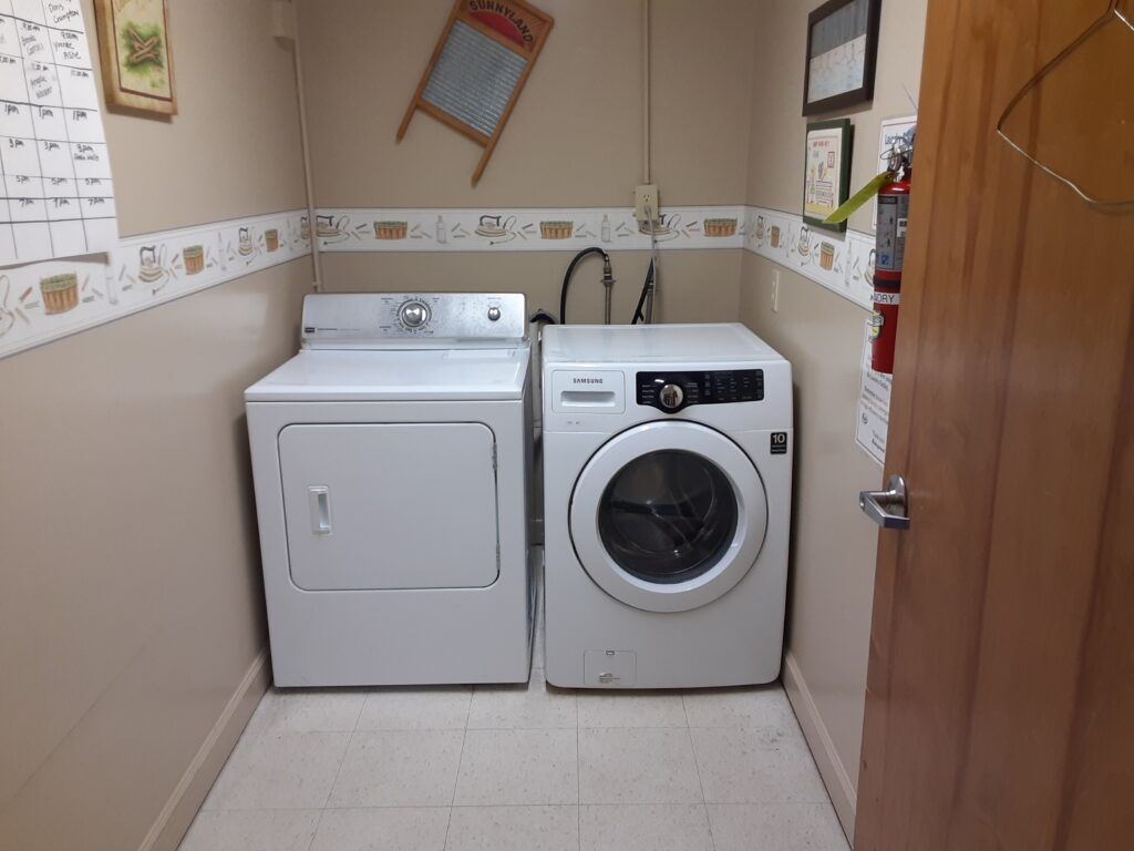 A laundry room featuring a washing machine and dryer.