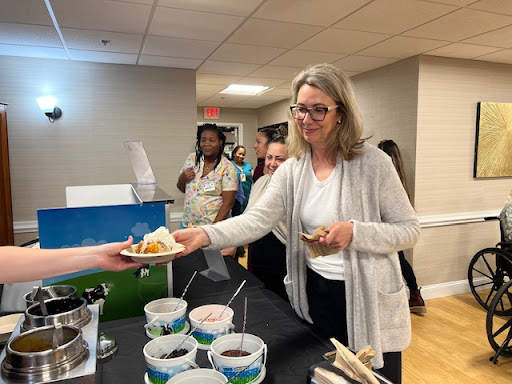 Attendees enjoy refreshments at a community event.