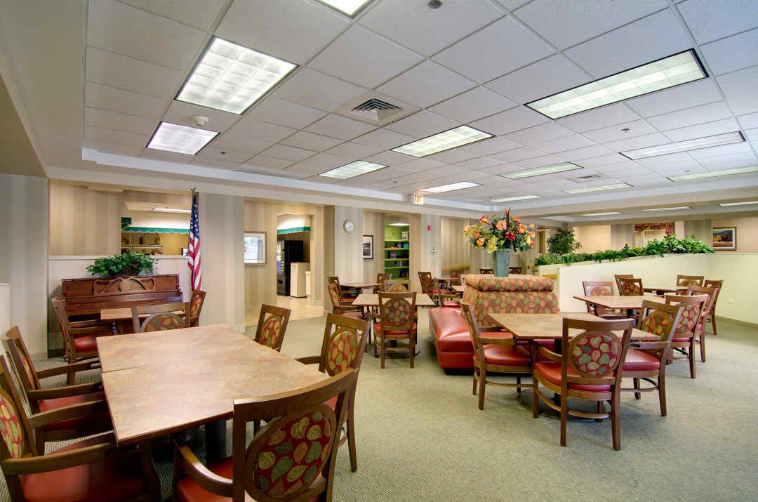 A spacious office waiting area with comfortable seating and elegant decor.