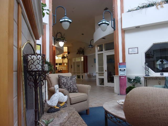 A cozy lobby with comfortable seating and elegant lighting.