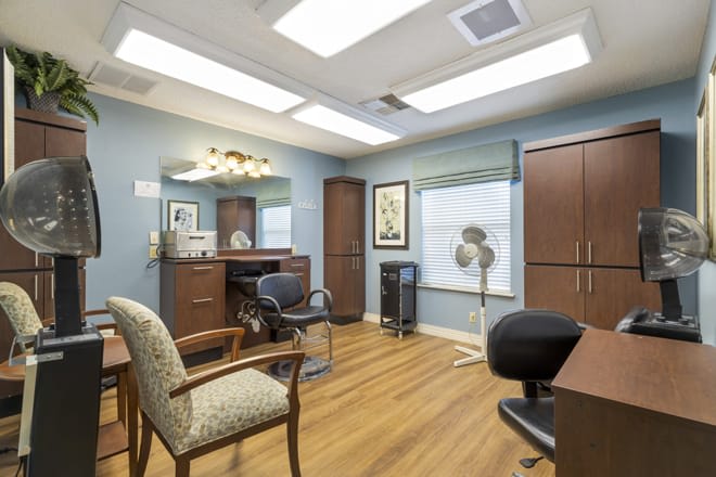 A neatly arranged office space with furniture and decor.