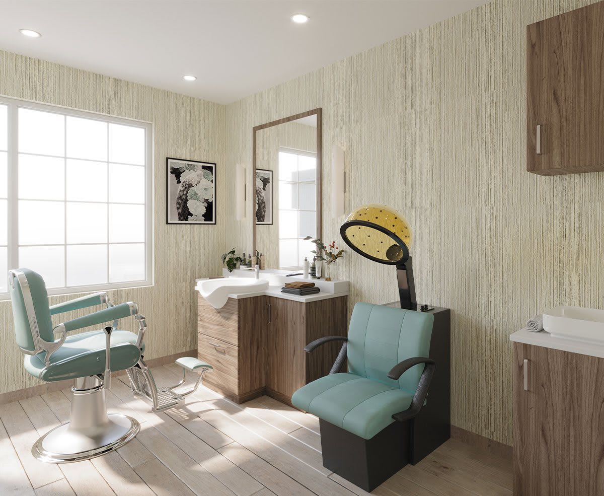 A well-lit hair salon interior featuring a styling chair, sink, and hair dryer.