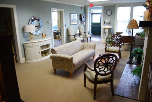 A cozy waiting area with comfortable seating and tasteful decor.
