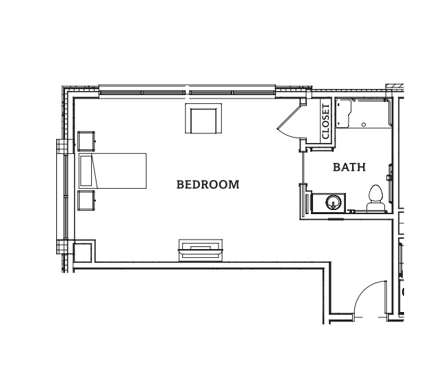 A basic floor plan featuring a bedroom and a bathroom.