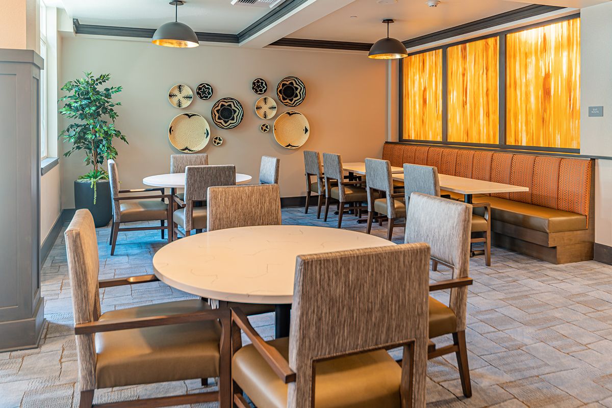 Modern dining area with stylish decor and comfortable seating.