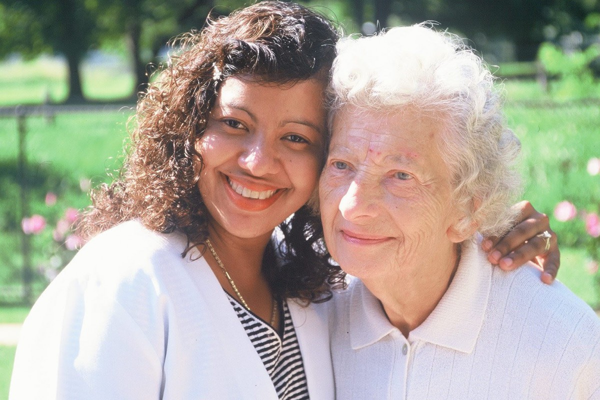 A joyful moment shared between two women of different generations.