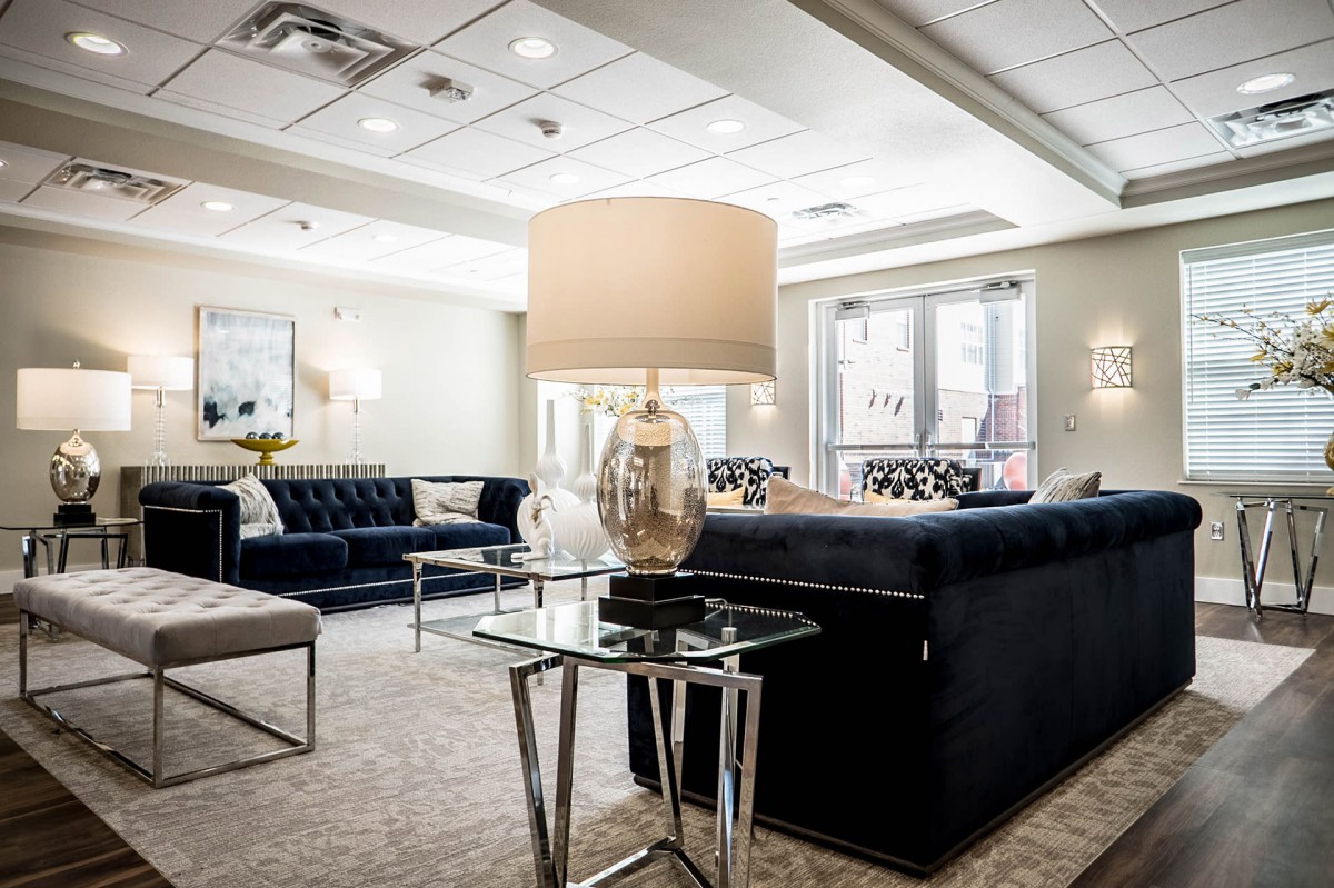A modern living room with elegant furnishings and a cozy atmosphere.