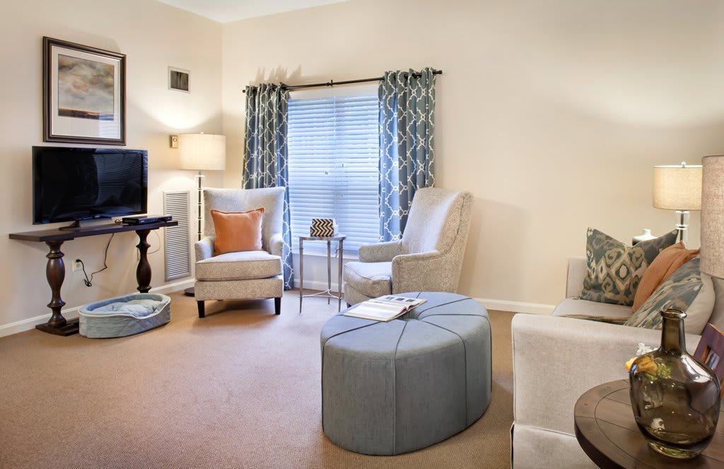 A cozy living room with comfortable seating and stylish decor.