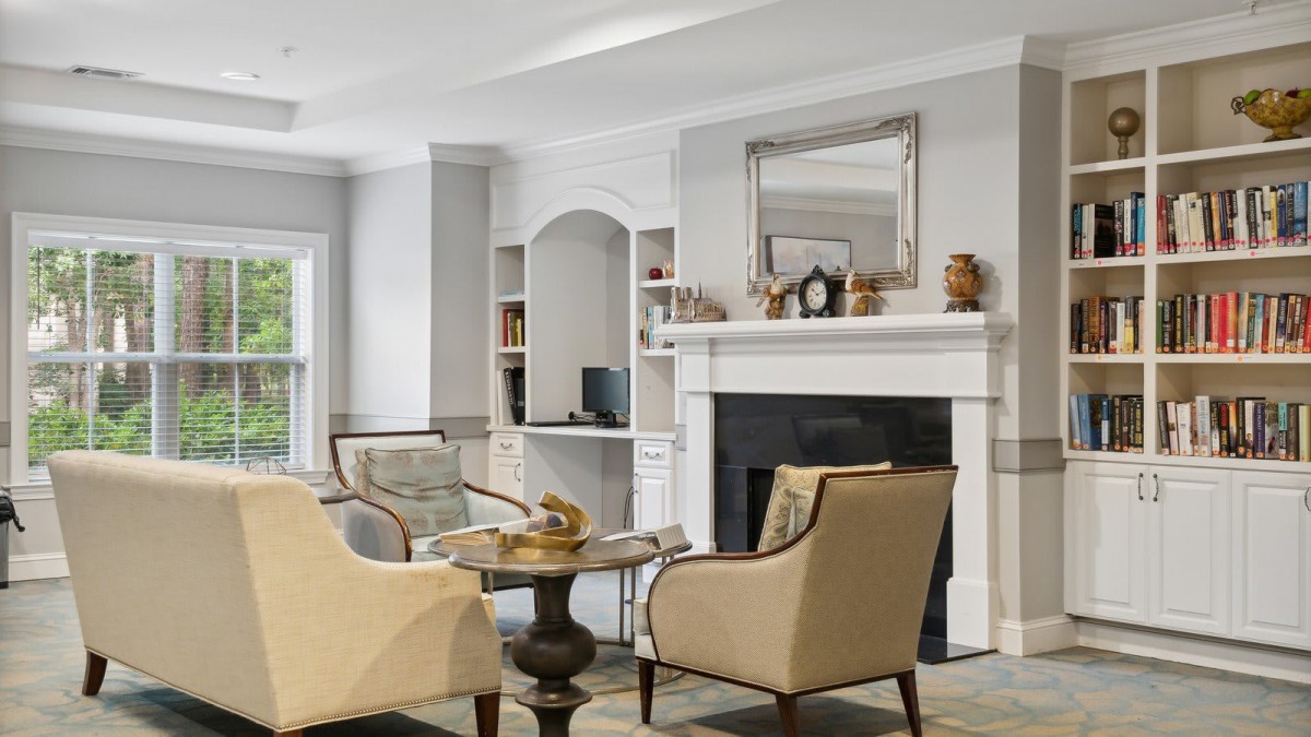 A cozy living room with elegant furniture and a fireplace.