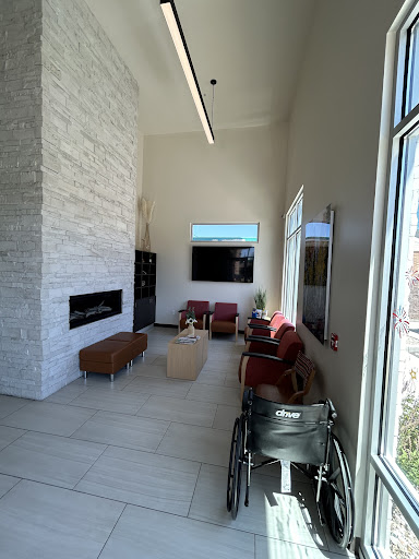 A spacious and modern living room designed for comfort and accessibility.