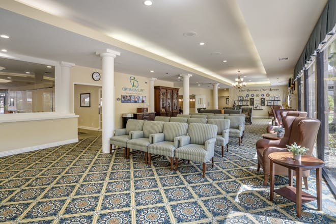 A spacious lobby area with comfortable seating and elegant decor.