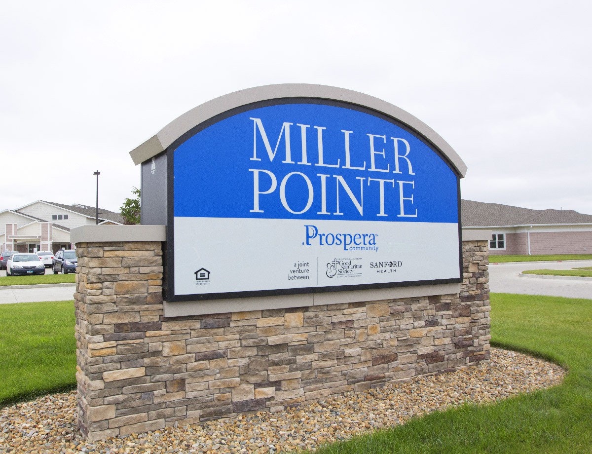 A sign for Miller Pointe, a prominent landmark in the area.