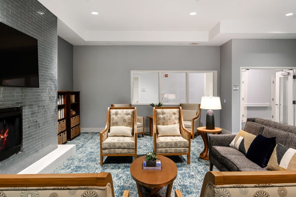 A cozy living room with comfortable seating and neutral decor.