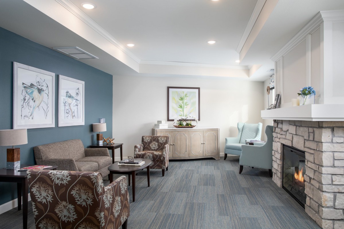 A modern living room featuring comfortable seating and elegant decor.