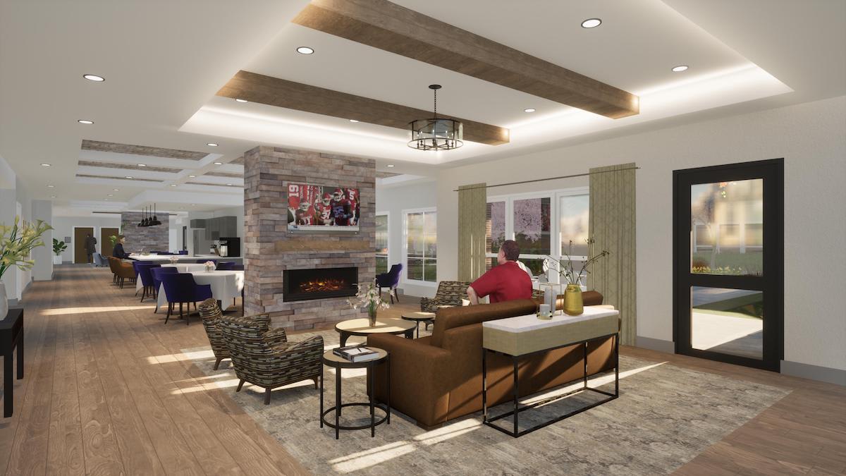 A modern living room with a cozy fireplace, stylish furniture, and exposed ceiling beams.
