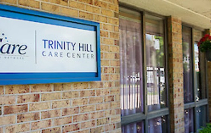 Entrance of Trinity Hill Care Center with visible signage on a brick exterior.