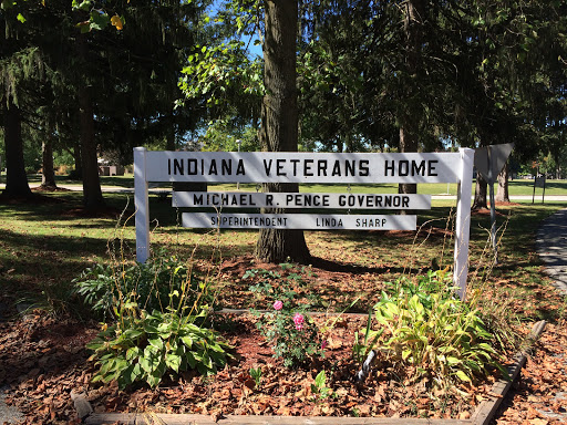 A sign marking the Indiana Veterans Home, dedicated to providing care and support for veterans.