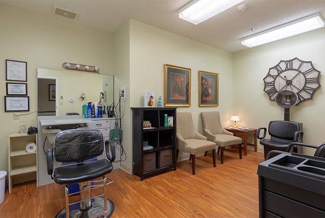 Cozy hair salon with comfortable seating and stylish decor.