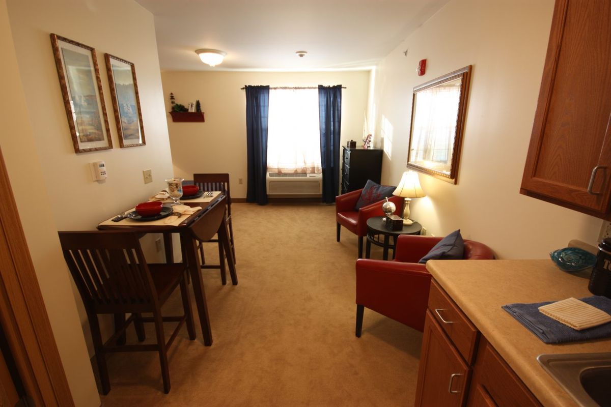 A cozy living room with a dining area and comfortable seating.