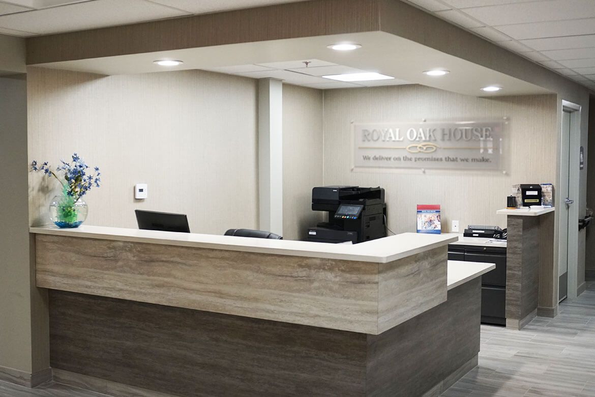 A modern office reception area with a sleek, minimalist design.