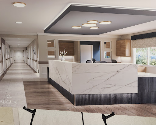 A modern reception area featuring elegant marble countertops and contemporary decor.