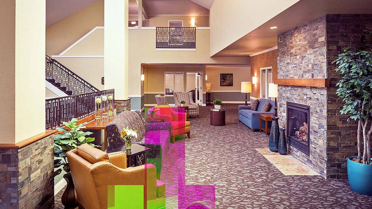 A spacious and modern hotel lobby with comfortable seating and contemporary decor.