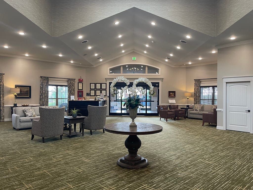 Spacious and welcoming lobby with elegant decor and comfortable seating.