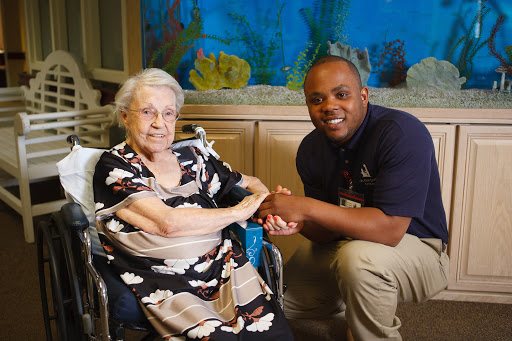 A warm moment between a caregiver and an elderly individual, showcasing compassion and connection.