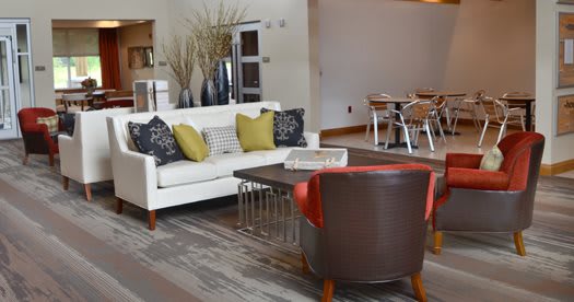 A modern living room with stylish furniture and cozy decor.