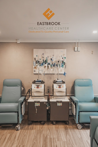 A serene treatment room equipped with infusion chairs for patient care.