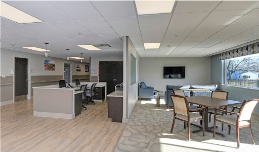 A contemporary office layout featuring modern furniture and an inviting workspace.