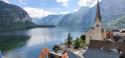 A breathtaking view of the mountains reflecting in a serene lake, perfect for capturing memories.