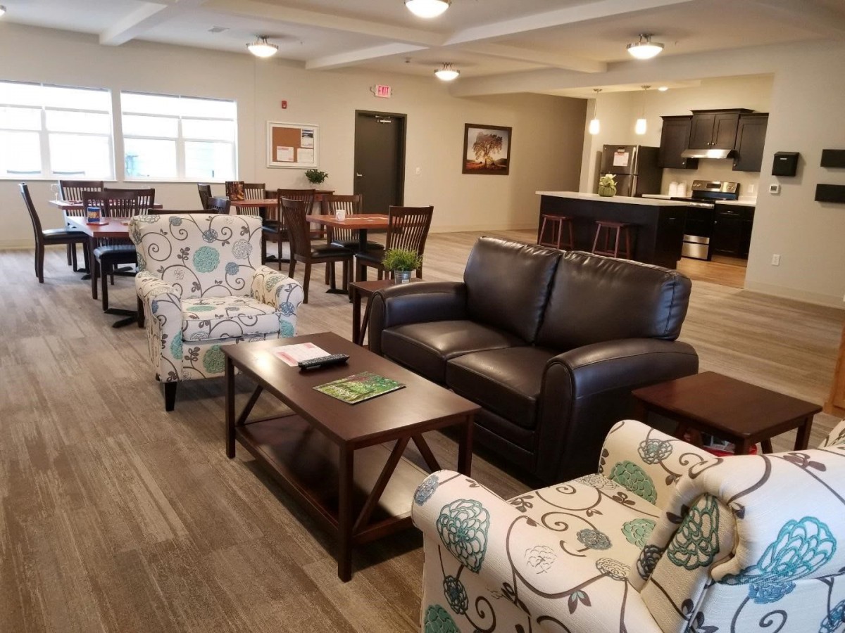 A spacious and comfortable living area with modern furniture and an open layout.