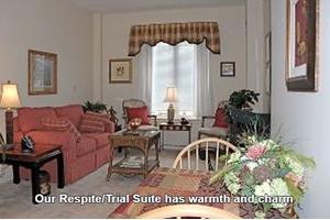 Cozy living room with warm decor and comfortable furnishings.