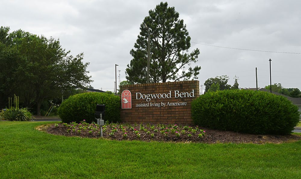 Entrance sign for Dogwood Bend surrounded by landscaping.